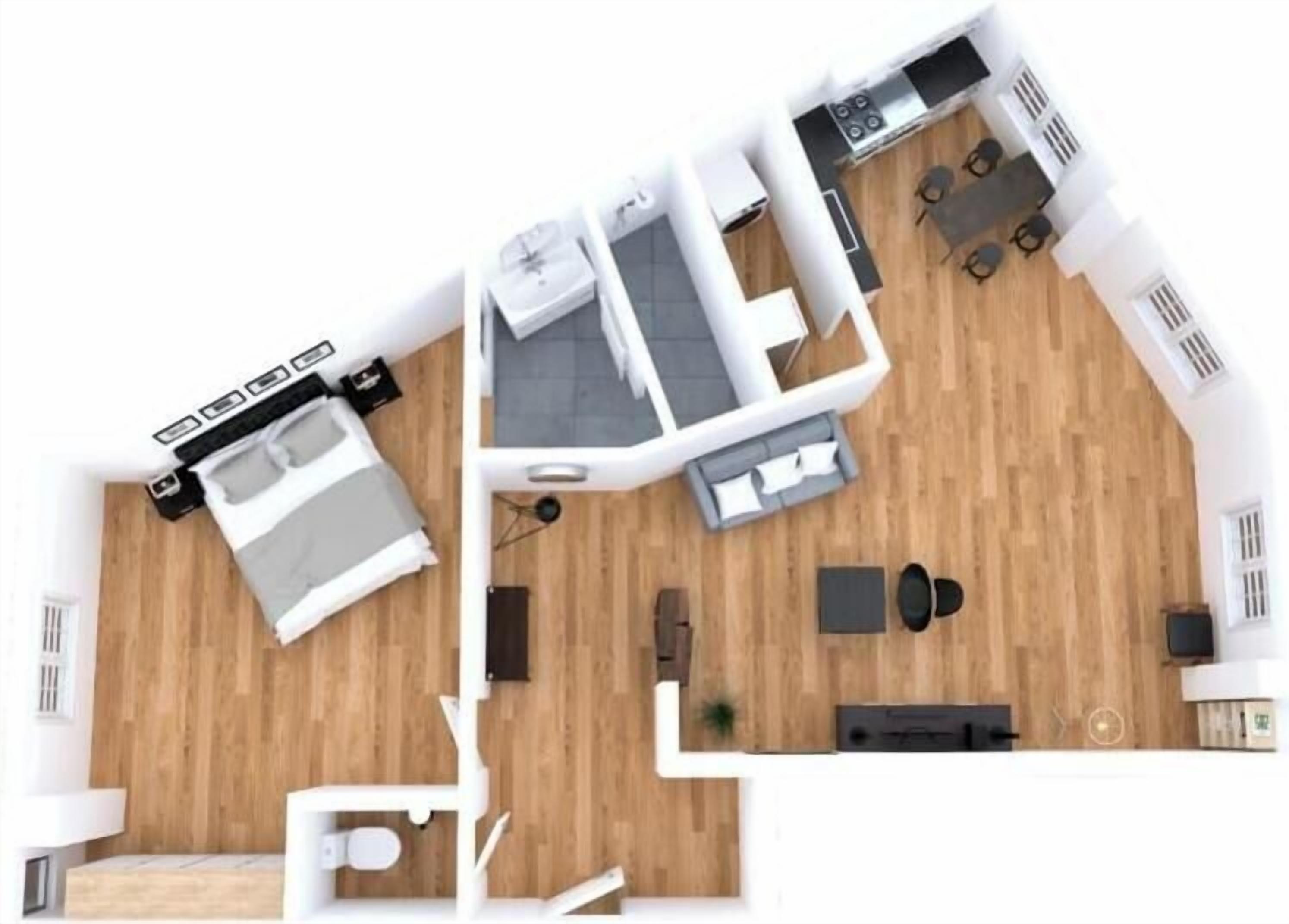 Grundriss einer 2-Zimmer-Wohnung mit Küche, Essbereich und einem kleinen Balkon.
