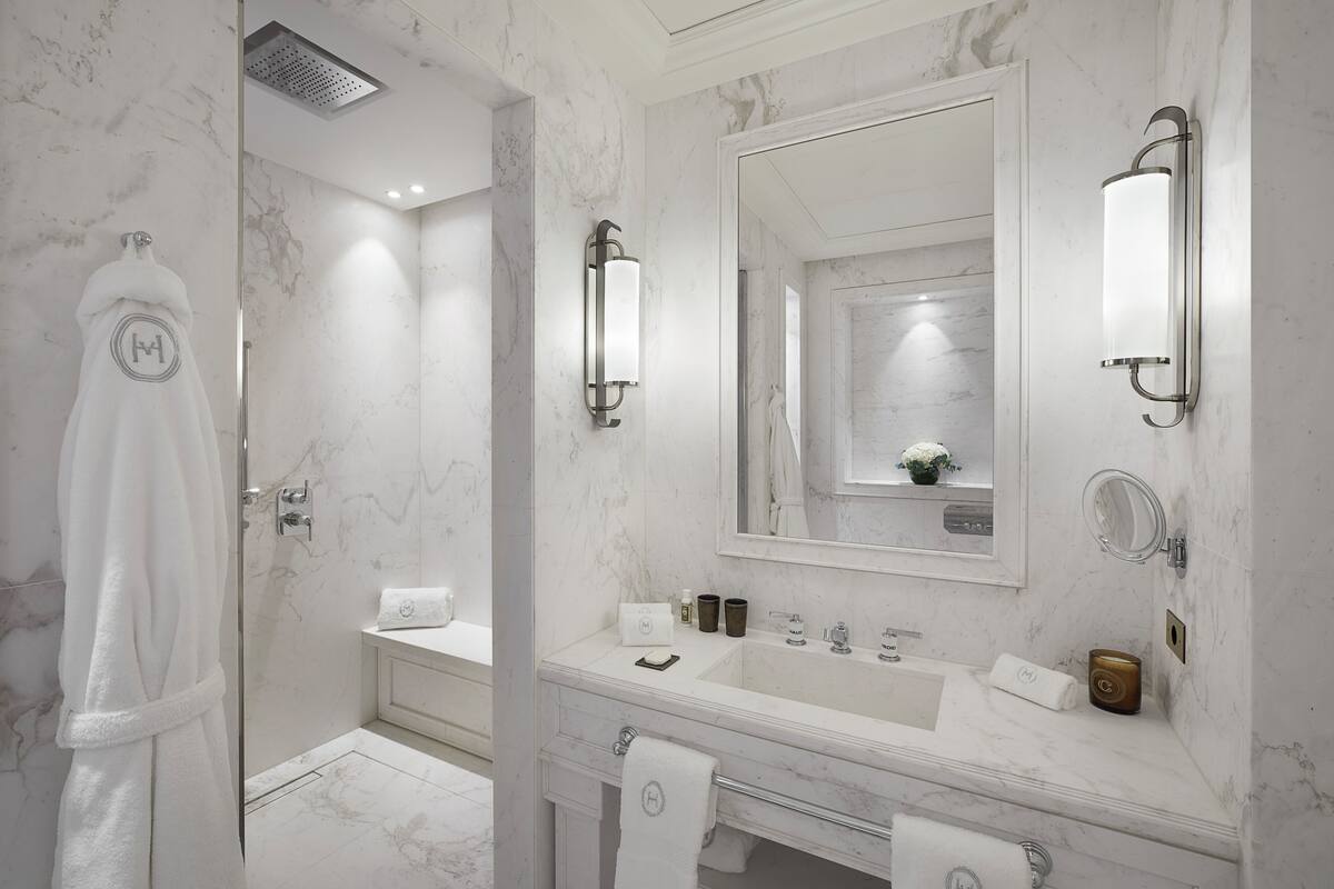 Hair dryer, slippers, towels, soap