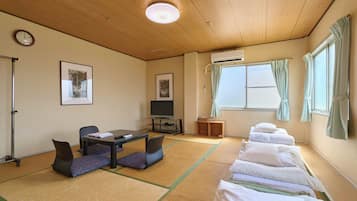 Japanese-style Triple Room, Smoking, Shared Bathroom (for 3 pax) | Down comforters, free WiFi, bed sheets