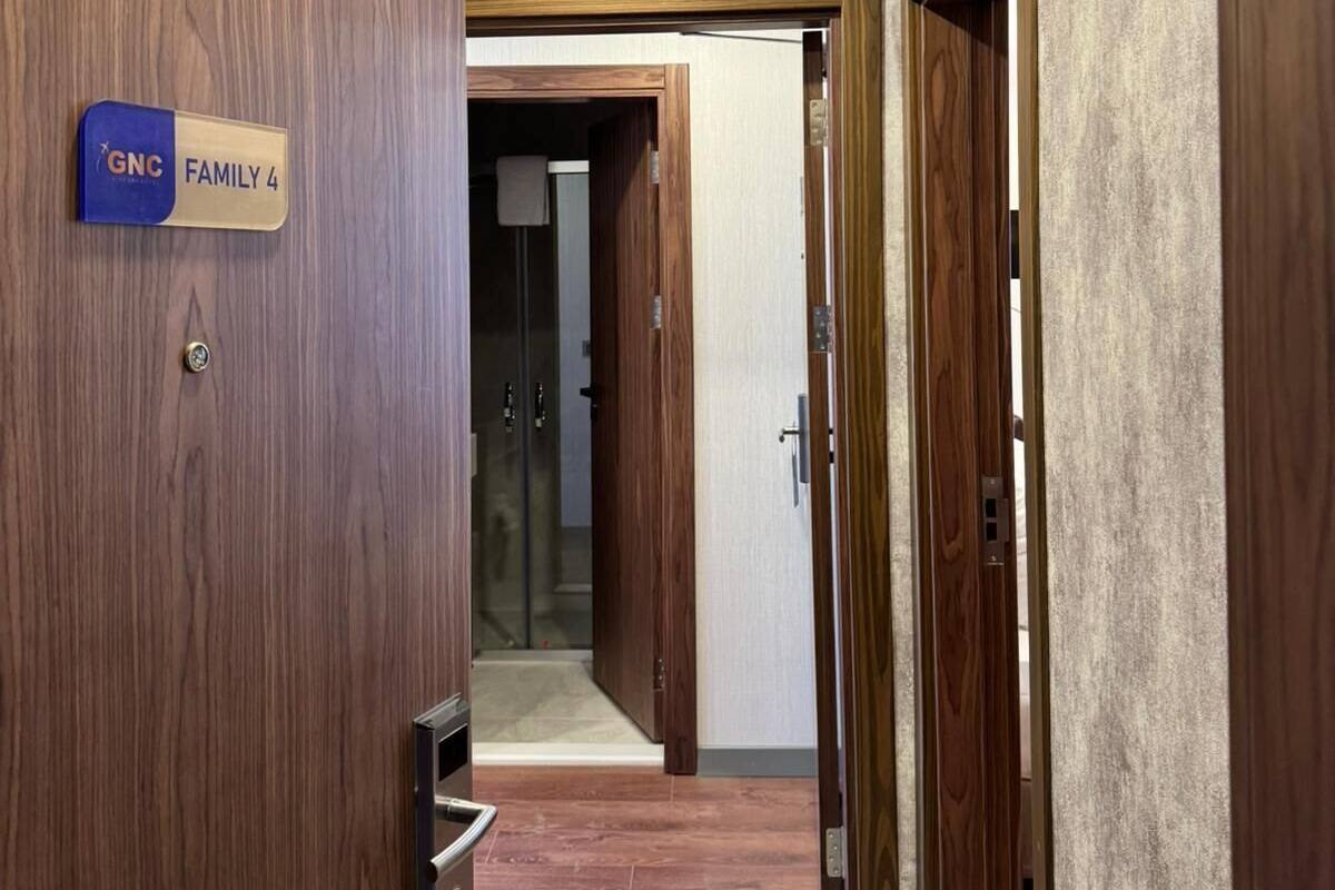 Deluxe Quadruple Room, City View | Egyptian cotton sheets, premium bedding, in-room safe, desk
