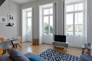Departamento Deluxe, vista al río | Área de sala de estar