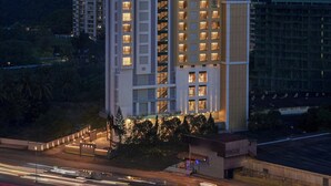 A multi-story hotel with a prominent sign reading "The Fern Residency." - The Fern Residency Mumbai, Mira Road, Series by Marriott (Mumbai)