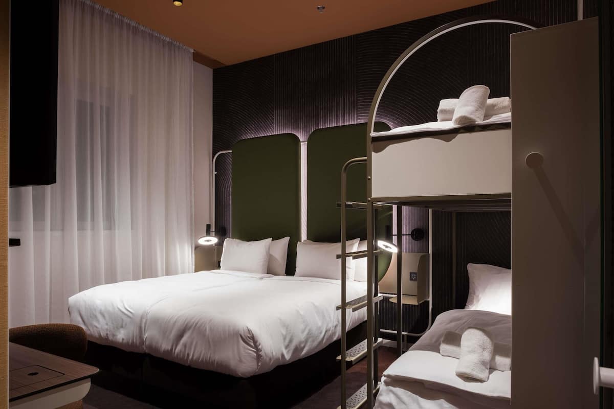 Deluxe Room, Multiple Beds | Blackout drapes, free WiFi, bed sheets