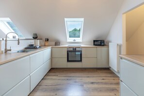 Fridge, microwave, oven, stovetop - Vacation apartment "Heimathafen" in Breklum for up to 4 people (Breklum)
