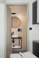 Superior Studio Suite, Balcony | Bathroom | Shower, free toiletries, hair dryer, slippers