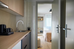 Exclusive Apartment, Balcony | Private kitchen | Mini-fridge, electric kettle, high chair