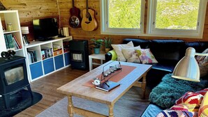 Cabin, 5 Bedrooms, Smoking, Patio | Living room | Books - Charming Mountain Cabin (Strand)