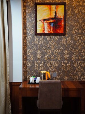 Premium bedding, desk, laptop workspace, free WiFi