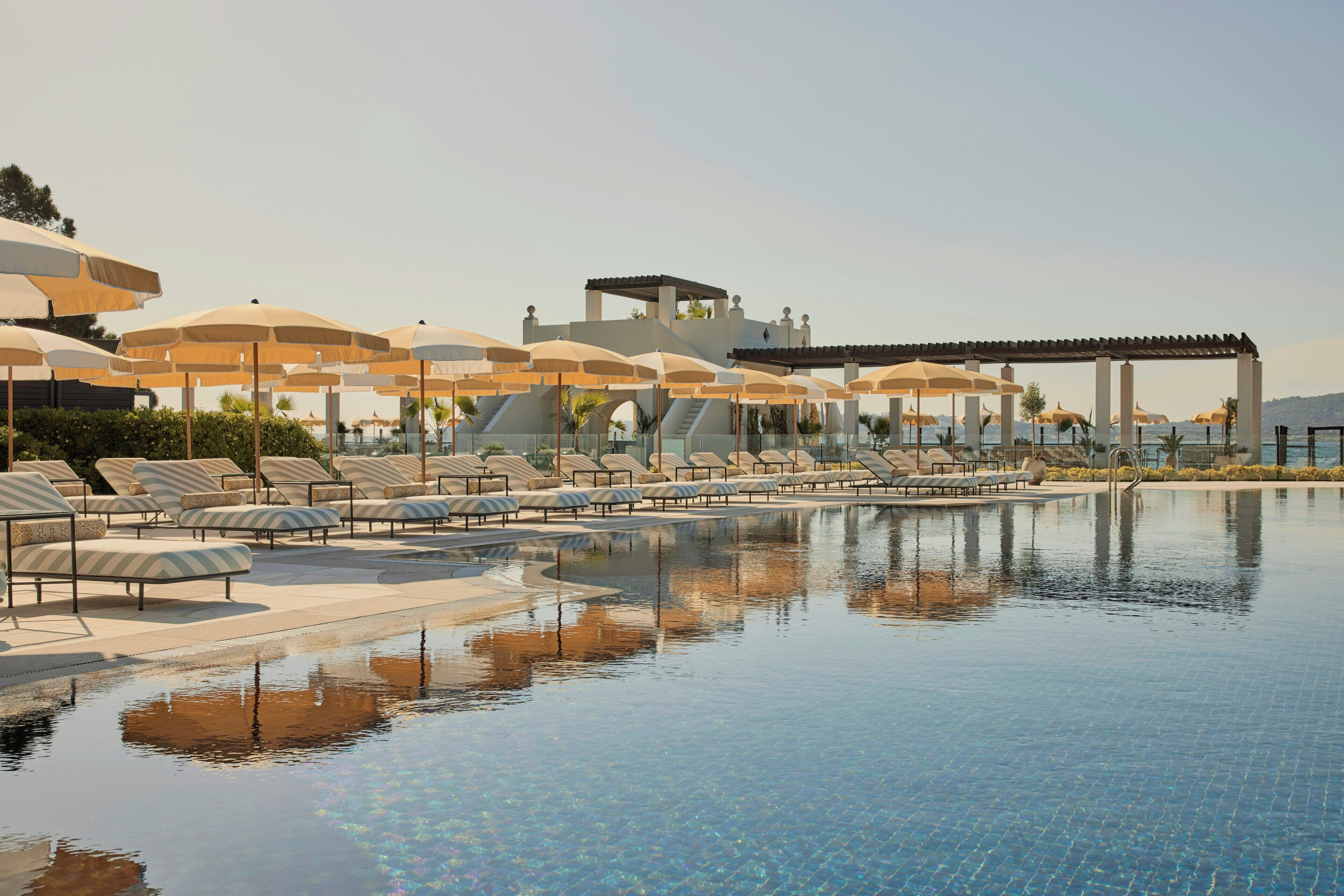 Outdoor pool, pool umbrellas, sun loungers