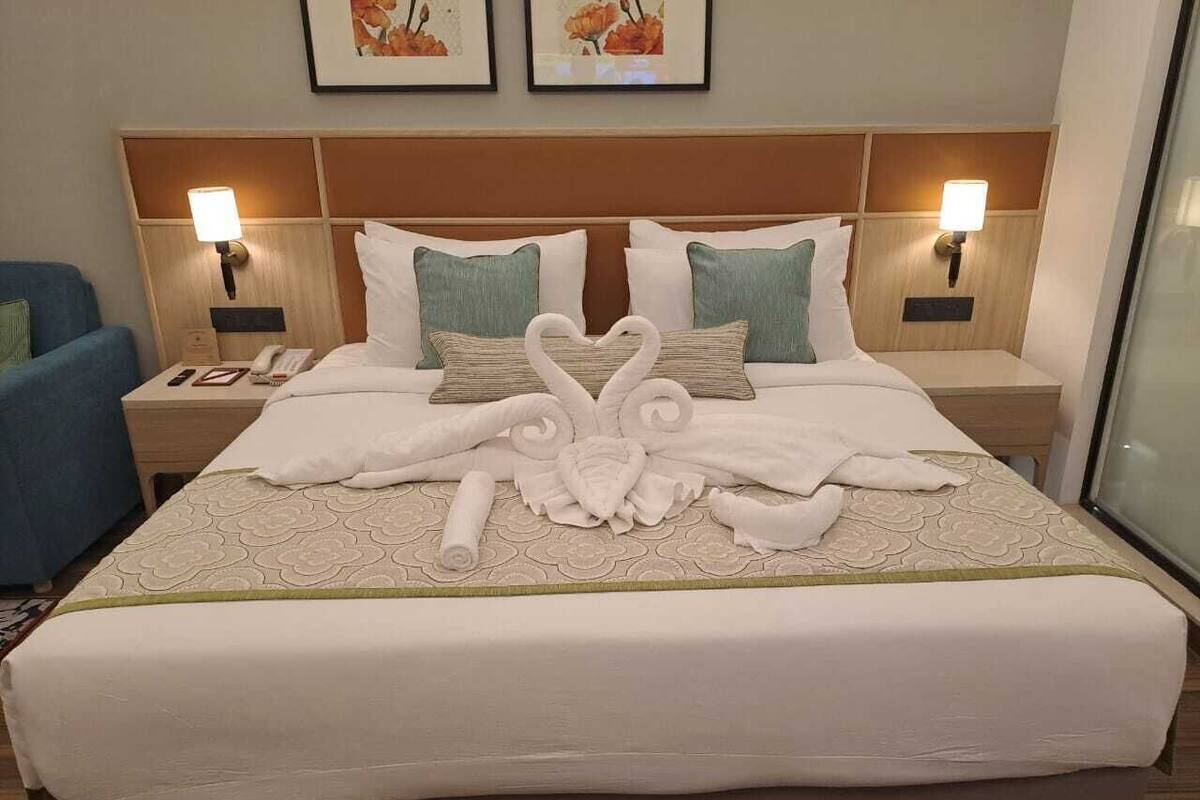 Dobbelt- eller tomannsrom – deluxe, byutsikt | Safe på rommet, strykejern/-brett og wi-fi (inkludert)