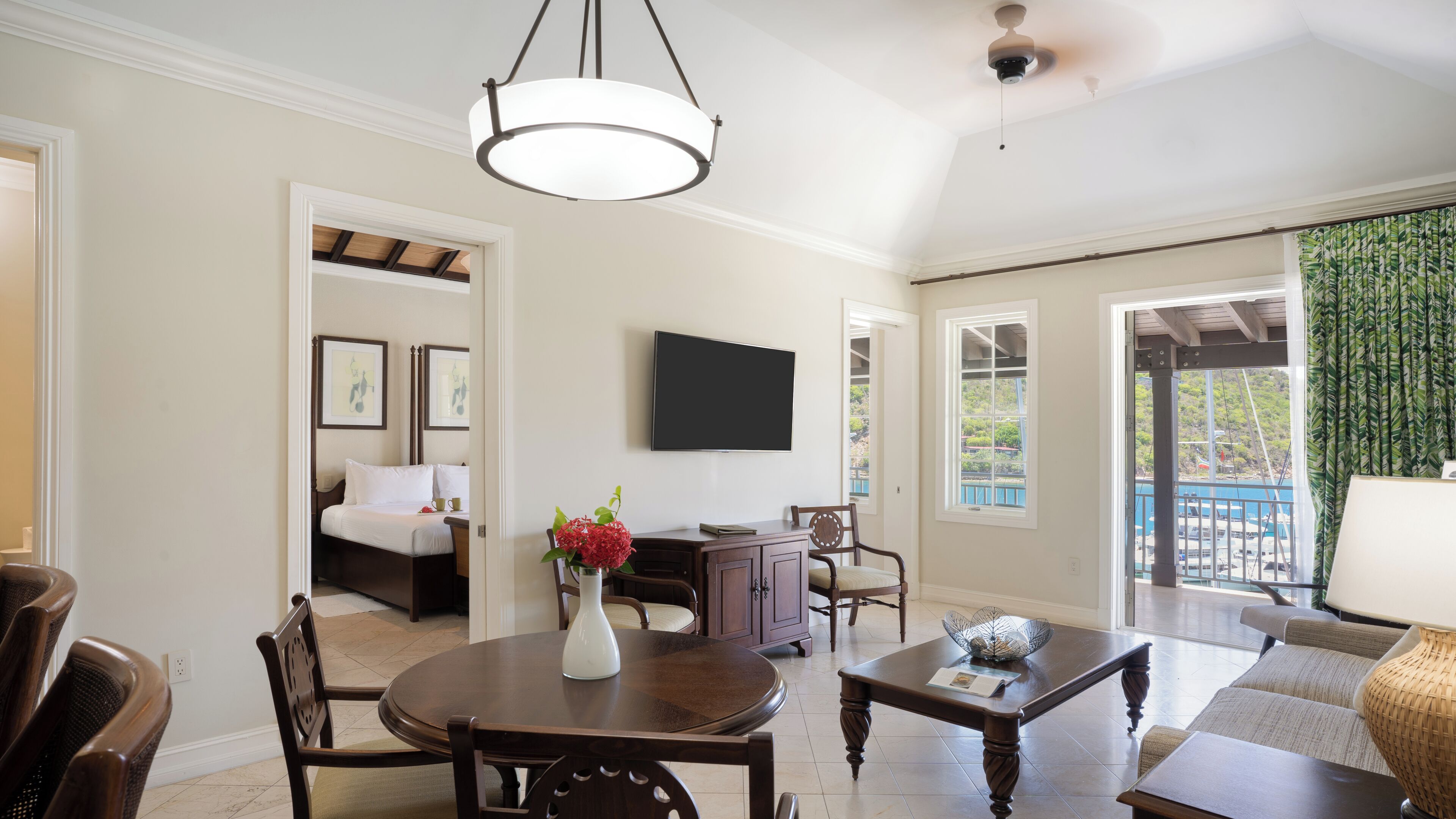 Relax together in the bright sitting area opening to the balcony.