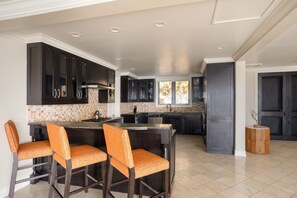 Fridge, coffee/tea maker, cookware/dishes/utensils