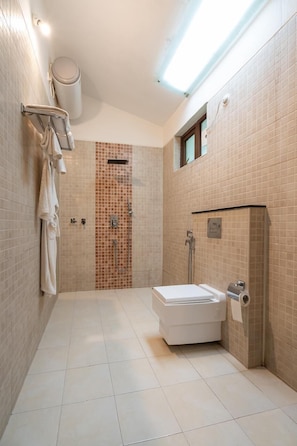 Shower, hair dryer, slippers, towels