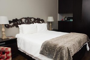 Premium bedding, memory-foam beds, in-room safe, individually decorated