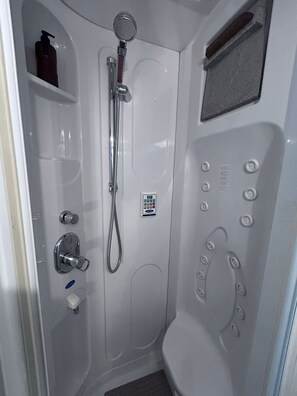 Shower, jetted tub, hair dryer, bidet