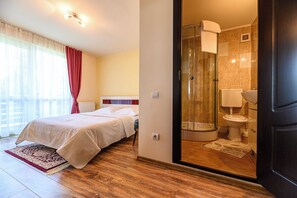 1 chambre, coffres-forts dans les chambres, fer et planche à repasser