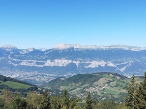 A mountainous landscape with a town nestled in the valley.