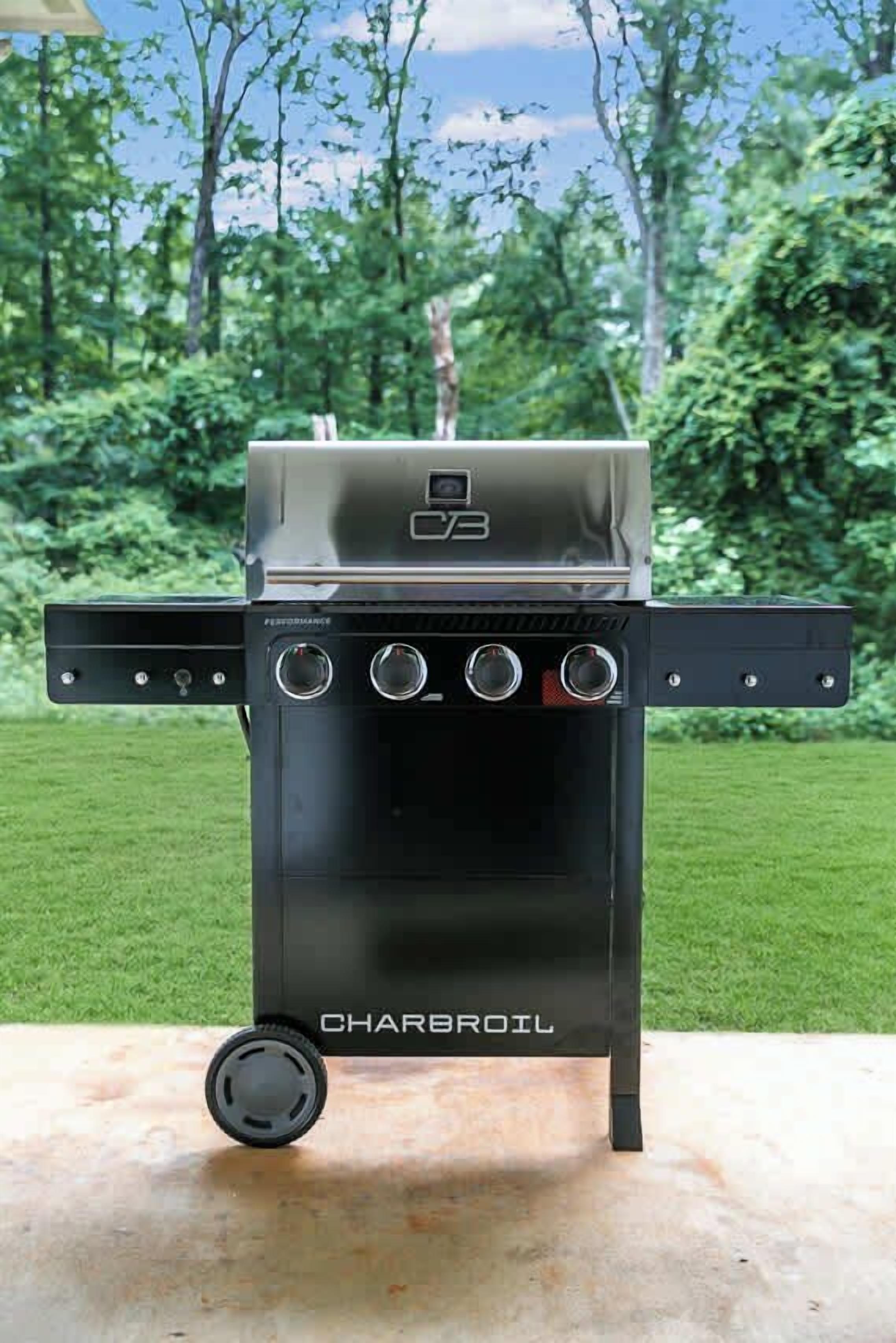 A portable charcoal grill with a control panel, wheels, and the brand name 'Charbroil' visible.