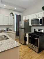 Jungle Aura | Private kitchen | Full-size fridge, microwave, oven, stovetop