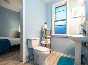 Shower, rainfall showerhead, eco-friendly toiletries, hair dryer