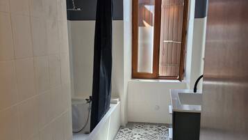 Shower, free toiletries, hair dryer, towels