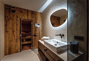 Douche, sèche-cheveux, serviettes fournies, savon