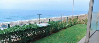 Apartment in Prestigia plage des nations with garden and direct access to the sea.