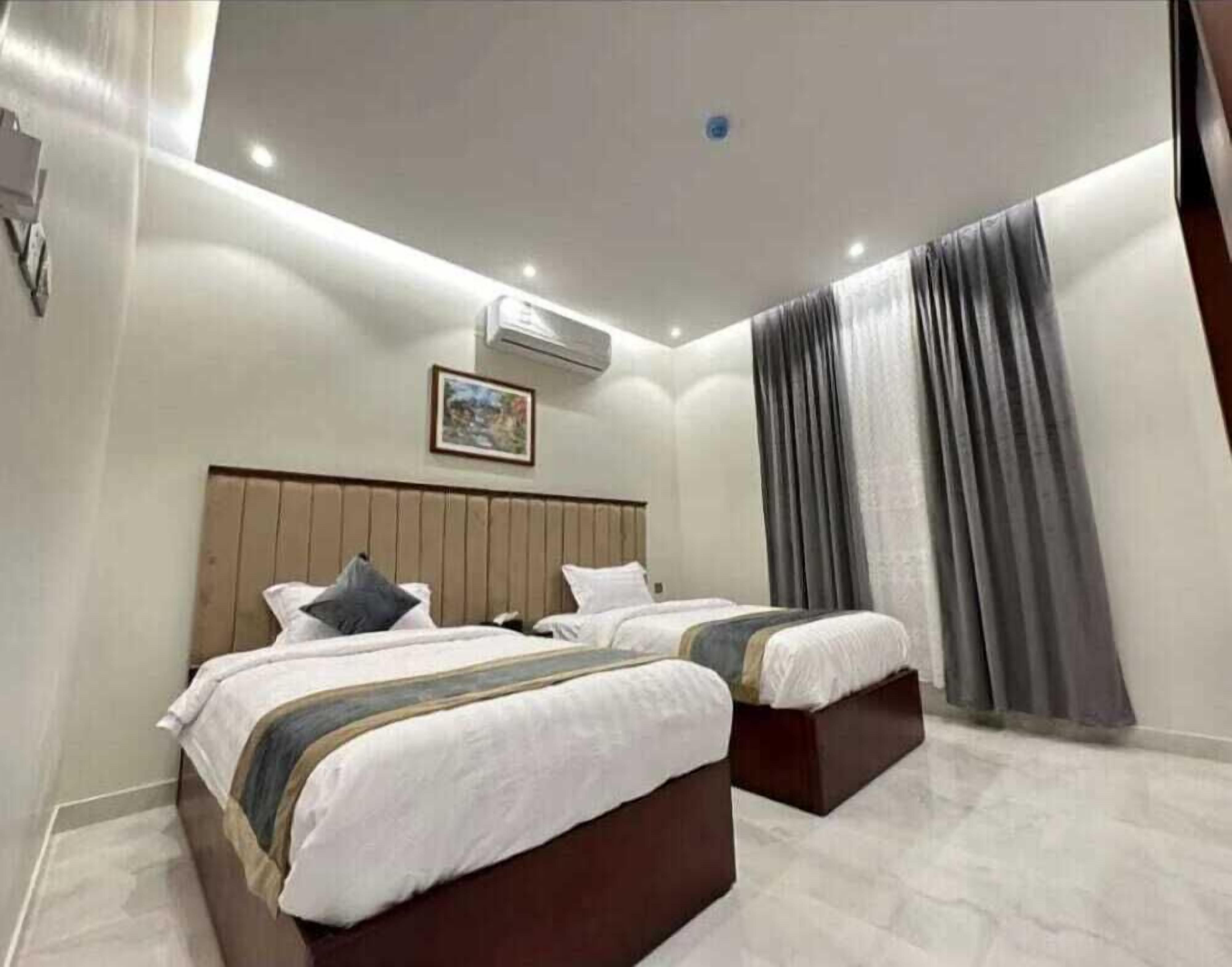 Family Suite, 2 Bedrooms | In-room safe, free WiFi