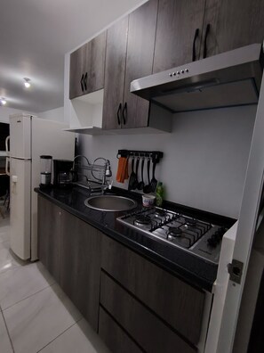 Parrilla de estufa y lavavajillas 