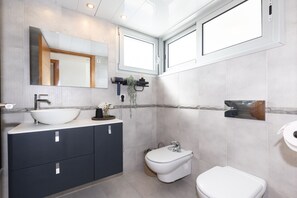 Douche, serviettes fournies
