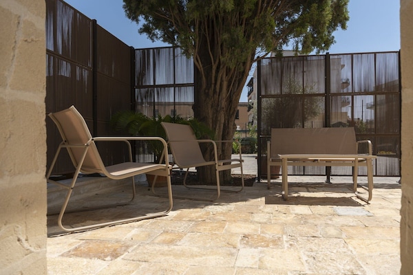 Deluxe Double or Twin Room, 4 Bedrooms, Balcony, Courtyard View | Terrace/patio