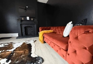 Family Apartment, Pets Allowed | Living area | 32-inch Smart TV with digital channels, Netflix, Hulu