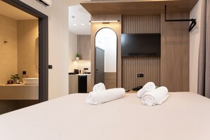 Apartment, Partial Sea View | Individually decorated, individually furnished, iron/ironing board