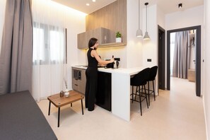 Apartment, Sea View | Private kitchen | Mini-fridge, microwave, oven, stovetop