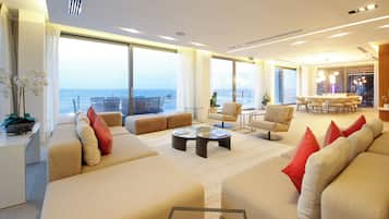 Villa, Sea View | Living room | 65-inch Smart TV with digital channels