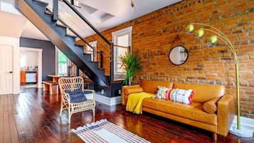 Exclusive Duplex, Non Smoking | Living area | 32-inch Smart TV with digital channels, Netflix, Hulu