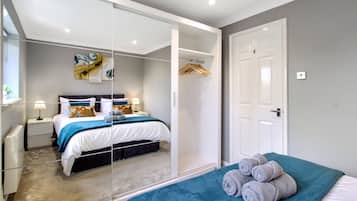 2 dormitorios, tabla de planchar con plancha, wifi gratis y ropa de cama