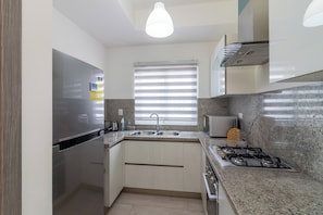Appartement Confort, vue piscine | Cuisine privée