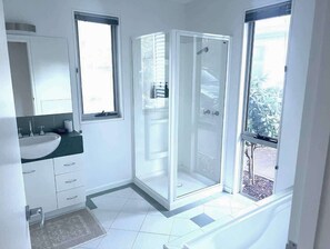 Shower, hair dryer, towels