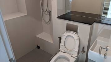 Hair dryer, towels, toilet paper