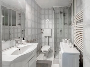 Shower, free toiletries, hair dryer, towels