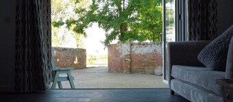 Grapnells Lodge cottages Essex sleeps 14. For families, retreats, RSPB Wallasea.