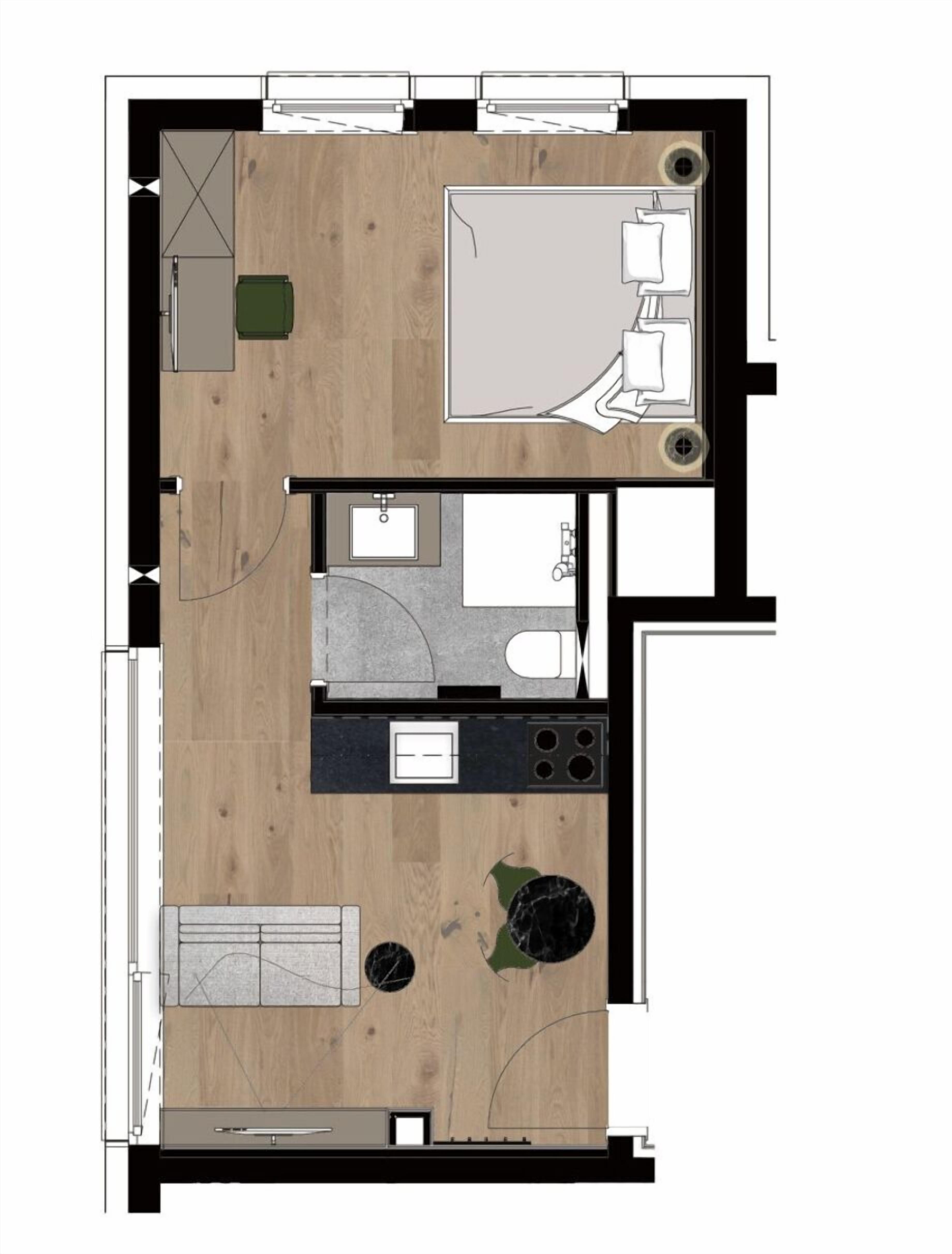 Plan d’étage d’une chambre d’hôtel comprenant un coin cuisine, une salle de bain et un espace salon.