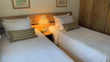 Apartamento standard | Cofres nos quartos, Wi-Fi de cortesia, roupa de cama
