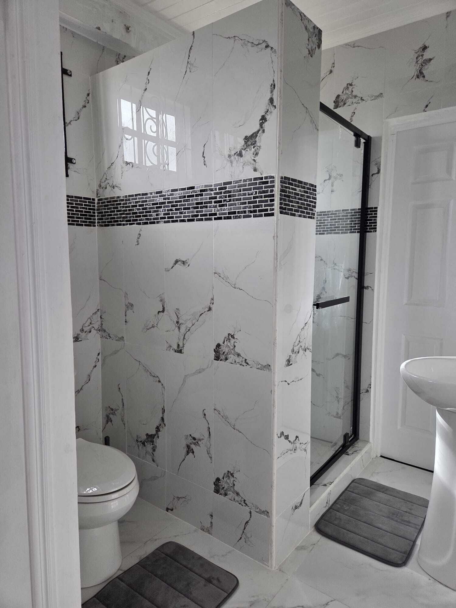 Shower, towels, soap, toilet paper
