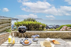 Outdoor dining - 3 bed with garden, parking & stunning ocean views (New Polzeath, Nr Wadebridge)
