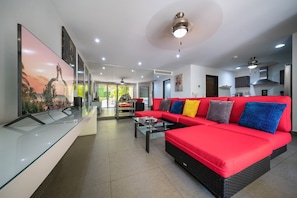 Deluxe Condo, Patio | Living area