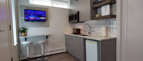 Fridge, microwave, coffee/tea maker, electric kettle