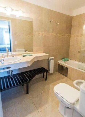 Jetted bath, hair dryer, bidet, towels