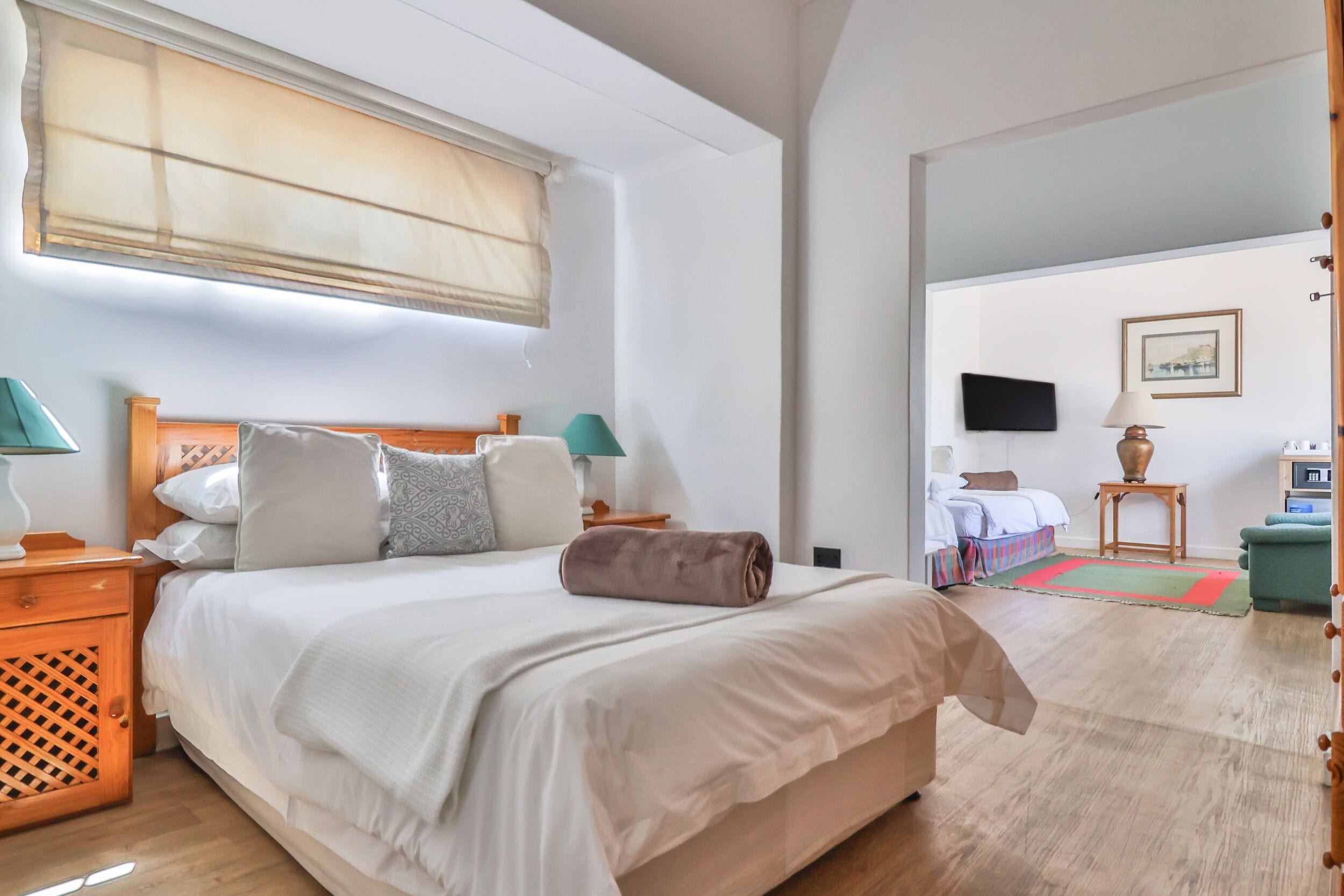 Room, Multiple Beds, Garden View, Ground Floor | In-room safe, free WiFi